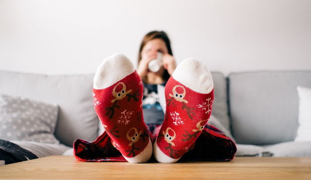 Woman wearing Christmas pyjamas