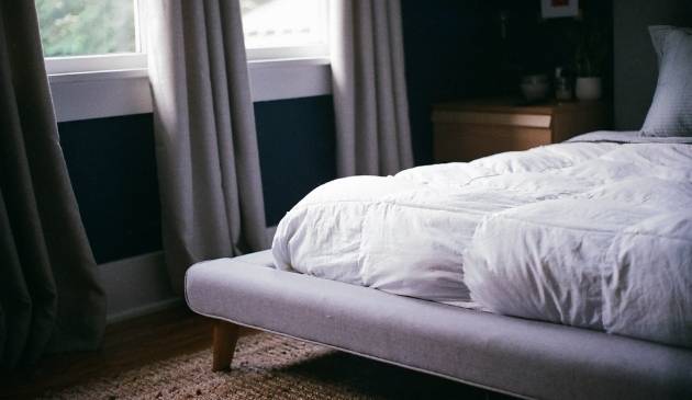 Mattress protector on a bed