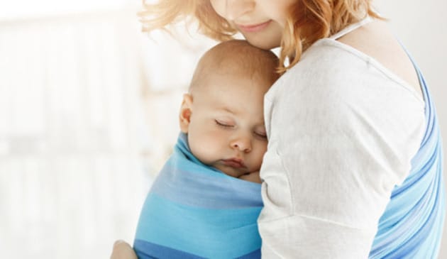 Baby being held