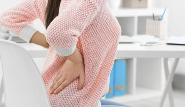 Woman with back ache