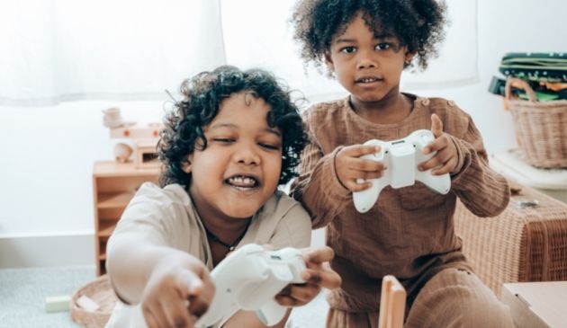two children playing video games