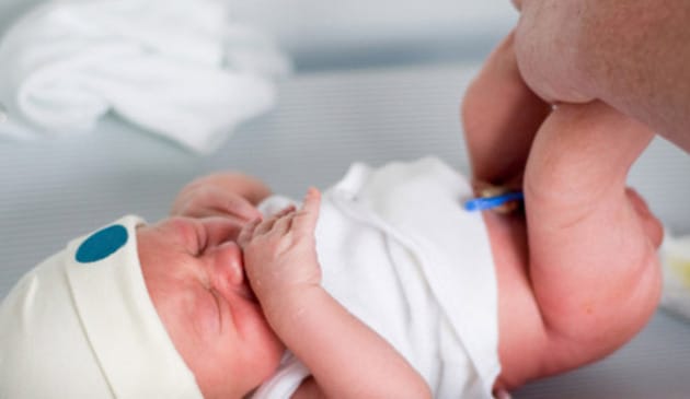 Changing newborn