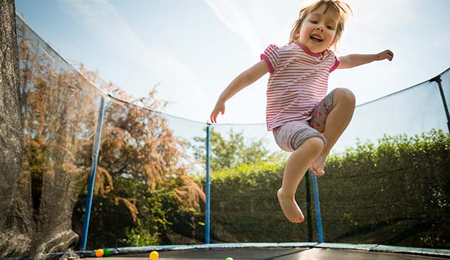 Child on trampoline