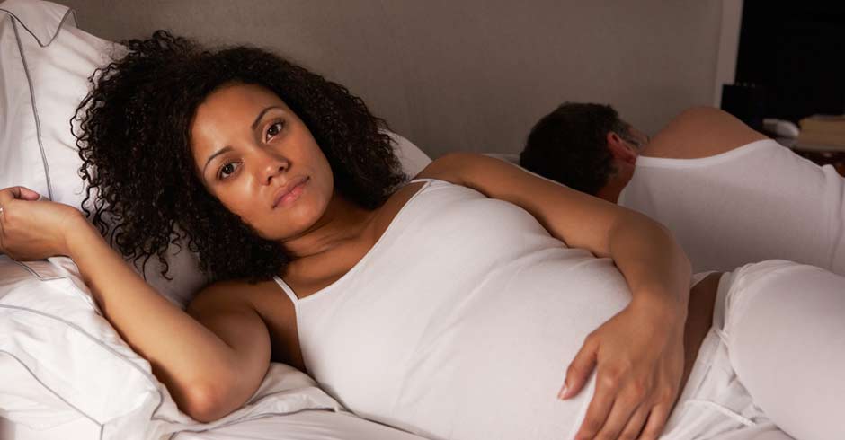 Pregnant woman trying to sleep