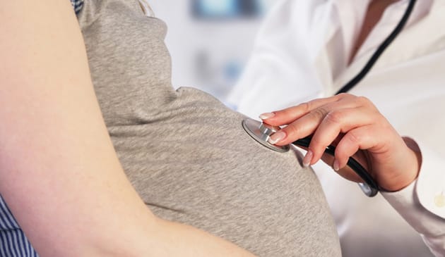 woman having check up at Doctor