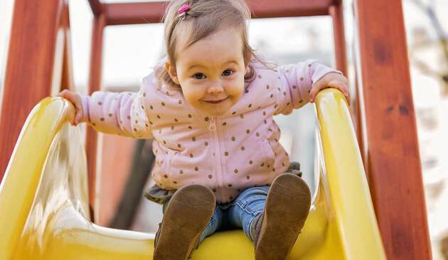 Toddler on slide