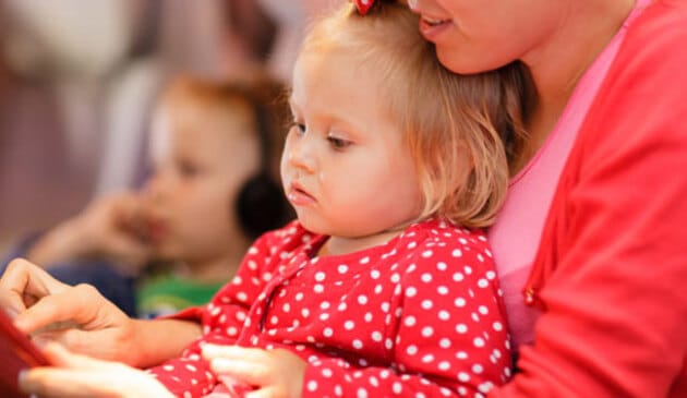 toddler with tablet