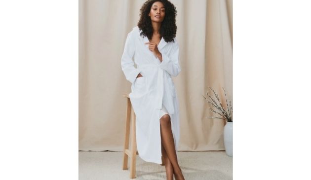 woman wearing white velour robe