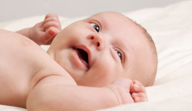 Ten week old baby lying down