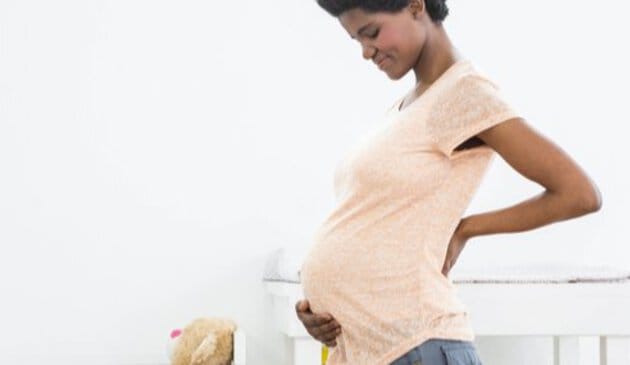 Woman touch pregnancy bump