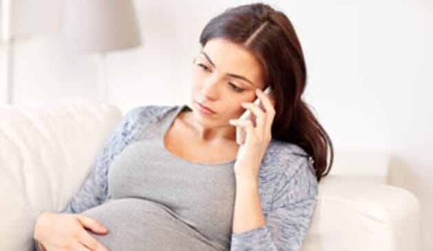 Sad woman on the phone