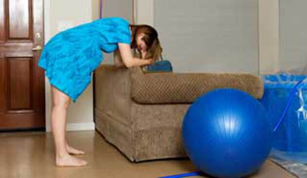Woman having a home birth